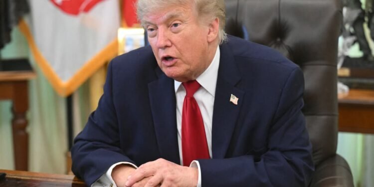 Trump rings Wall Street opening bells and says the stock market ‘is going to go through the roof’