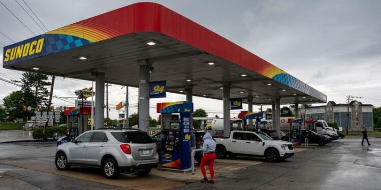 US consumer inflation likely increased at a slow pace in June as gasoline prices retreated