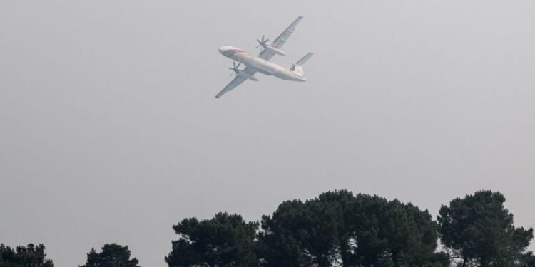 Wildfire rages near Paris as heatwave scorches Europe